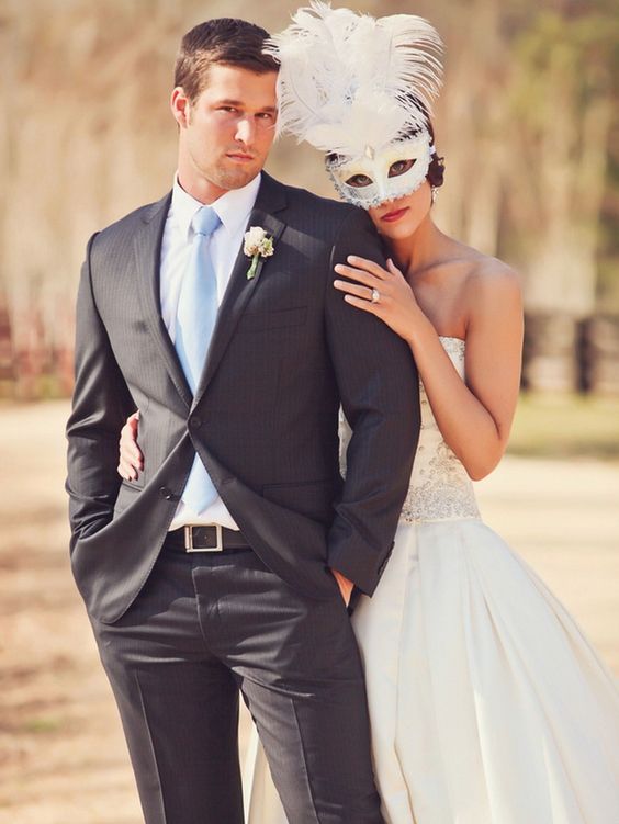 a cool white mask with feathers can become your main accessory
