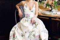 03 a floral wedding dress with thin straps and metallic shoes