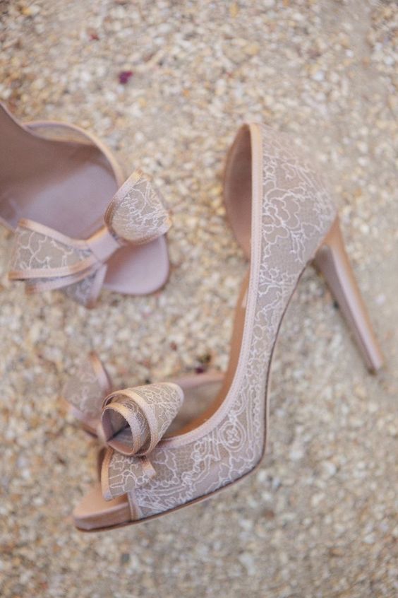 blush lace wedding shoes with peep toes and bows for a girlish look