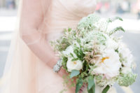04 She carried a neutral textural bouquet with greenery