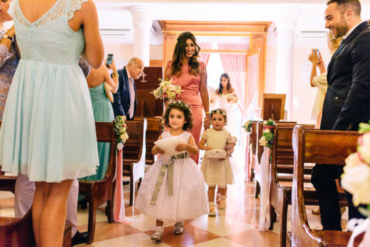 The bridesmaids were wearing metallic pink dresses