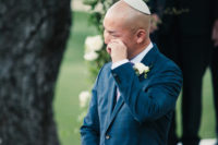07 The groom was wearing a windowpane blue suit, a pink tie and a traditional Jewish kippah
