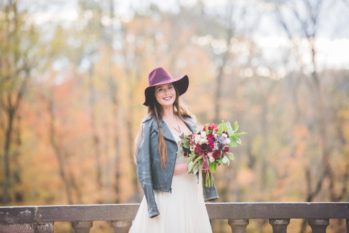 Wear a cool leather jacket and a purple hat with your romantic dress