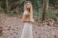 07 boho-inspired ivory lace wedding dresss with cap sleeves and a leaf crown