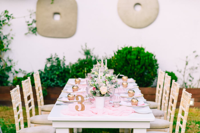 The bride chose a very romantic pink and gold wedding color scheme for the wedding