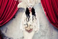 08 an oversized feather mask for a Mardi Gras bride
