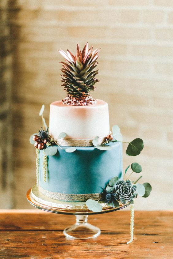 teal and copper cake with a pineapple topper is perfect for tropical tablescape