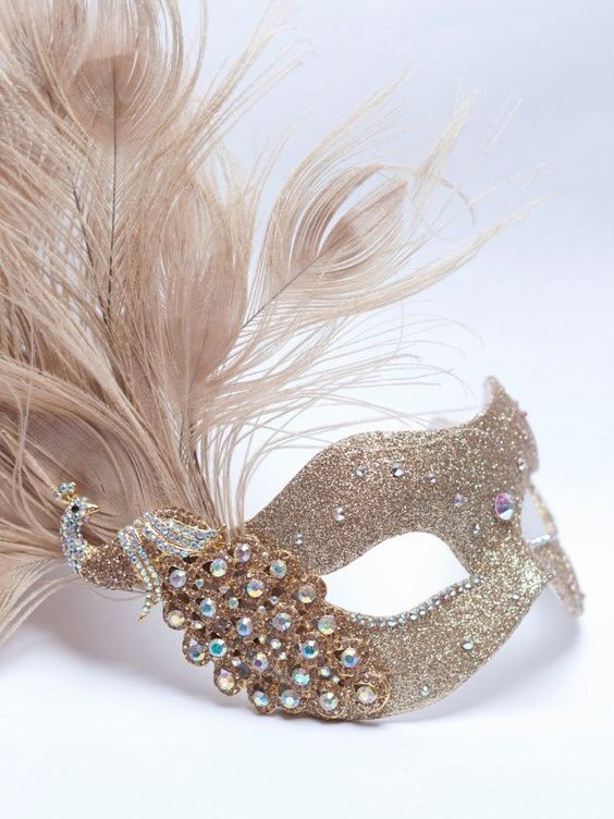 gold champagne Venetian mask decorated with rhinestones and feathers