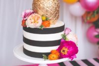 10 striped wedding cake with bold blooms and a gilded pineapple