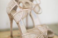 11 stunning off white high heel sandals with peep toes and ankle straps by Jimmy Choo