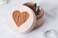 11 wooden ring box with a cut out heart and monograms