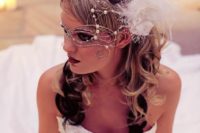 12 such a stunning delicate masks with pearls and a feather fascinator are right what a bride needs