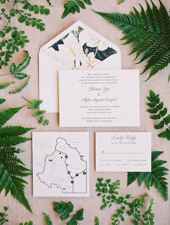 neutral wedding invites with tropical flower lining