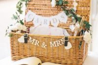 15 a cool basket decorated with a banner and white roses