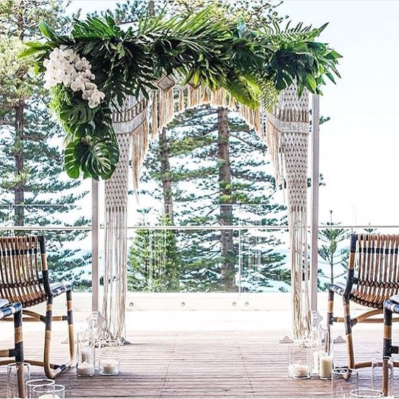 macrame, pal leaves and white orchids for a tropical boho wedding
