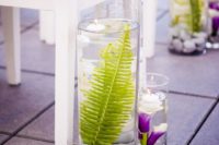 17 fern and orchid arrangaments in glass jars with pebbles