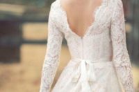 17 lace wedding dress with sleeves and a V cut back