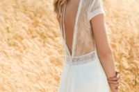 18 light lace wedding dress with an illusion V cut back