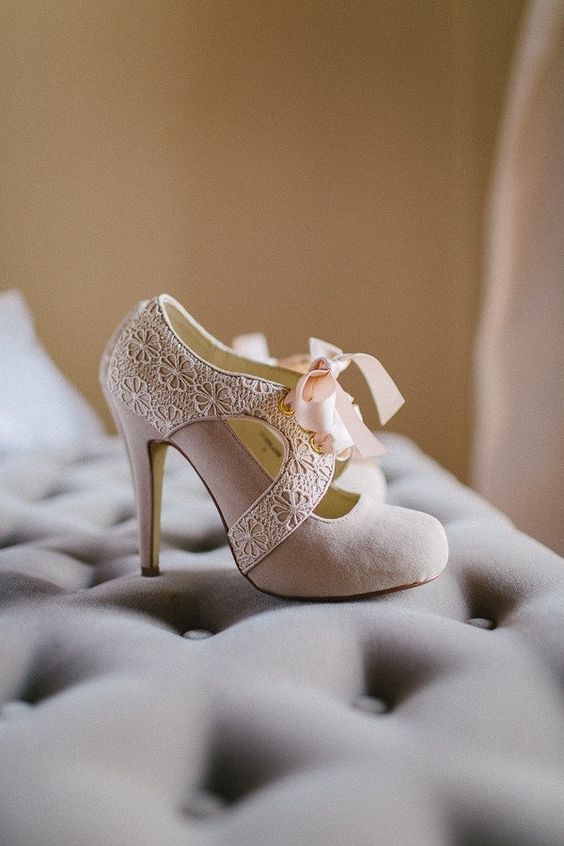 blush wedding booties with cutouts and lace detailing