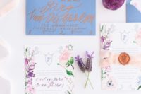 21 lavender-inspired wedding invitations with a blue envelope and calligraphy