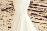 22 modern plain wedding dress with sleeves, a mermaid silhouette and a V cutout back