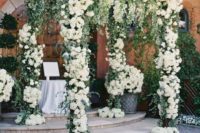 24 lush white flower wedding arch