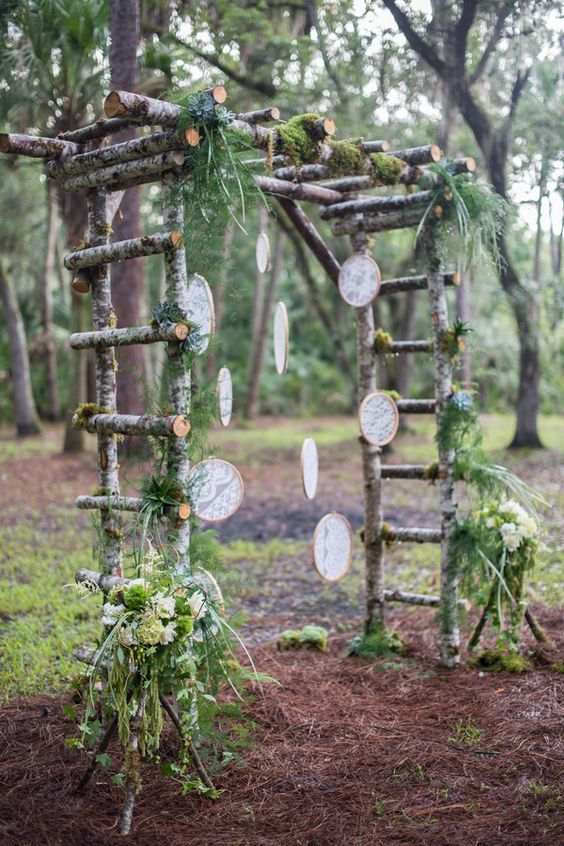 birch branch arch with greenery and lace dream catchers fits a boho woodland wedding