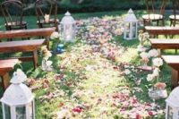 25 wedding aisle covered with flower petals screams summer and garden