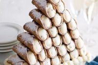 26 cannoli tower instead of a traditional wedding cake