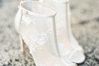 26 ivory sheer booties with peep toes and lace flower appliques