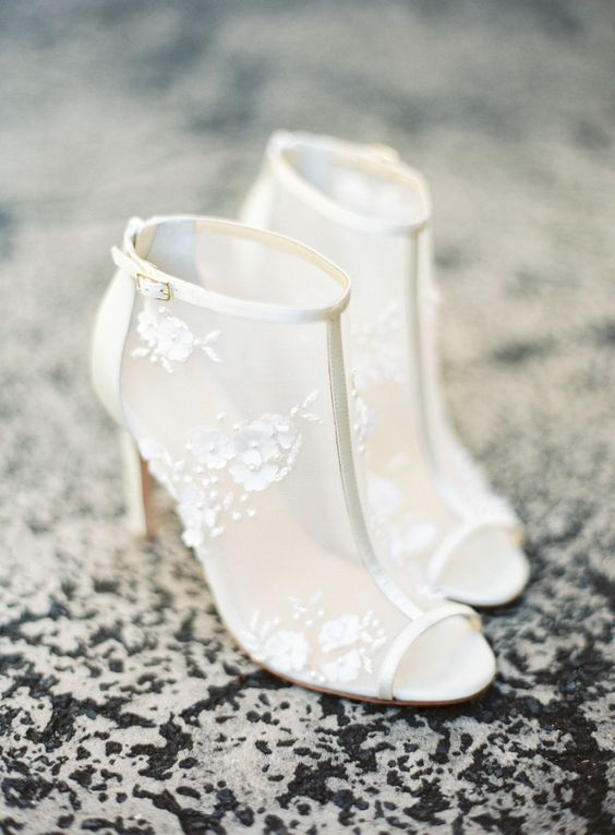 ivory sheer booties with peep toes and lace flower appliques