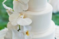 27 elegant white cake decorated with white orchids