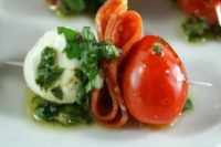 29 mozzarella, prosicutto, tomatoes and greenery for appetizers