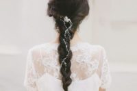 30 a messy braid with a crystal and pearl hair vine