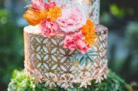 30 metallic pattern wedding cake with bold flowers