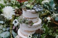32 naked wedding cake with succulents, thistles and leaves