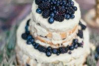 32 semi naked wedding cake with blackberries and blueberries