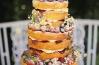 33 naked wedding cake with ripe berries, flowers looks veyr summer-like
