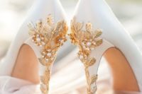 33 white platform shoes with gold cherry blossoms and pearls look luxurious