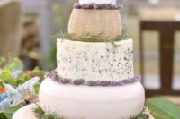 Provence-inspired cheese tower with herbs and lavender looks delicious