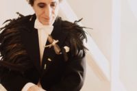 03 The groom’s suit was customized with feathers by the bride, and he also wore tiny antlers