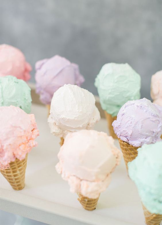 pastel ice cream cones serves on a board