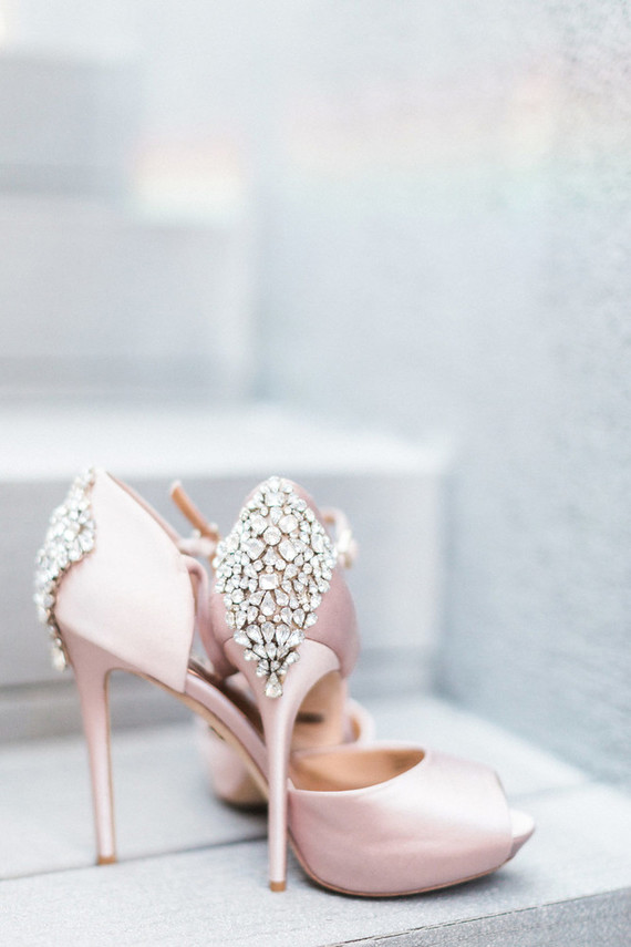 Glam pink shoes with rhinestones polished her look