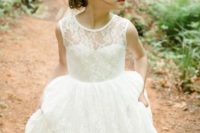 05 an ivory lace dress with an illusion neckline and a greenery crown
