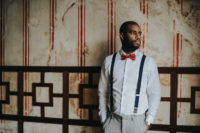06 The groom was wearing grey pants, a white shirt, navy suspenders and a red bow tie