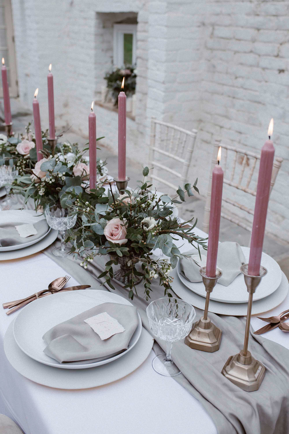 The table was laid with a grey table runner and napkins and pink candles, I love blush roses in the textural centerpieces