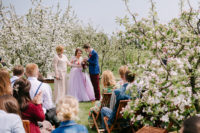 07 Just look at this stunning ceremony space with blooming apple trees