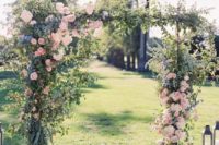 07 gorgeous wedding arch with pink roses, lilac flowers and greenery