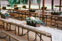 07 simple rustic benches and tables with floral box centerpieces