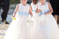 flower girls with white baskets